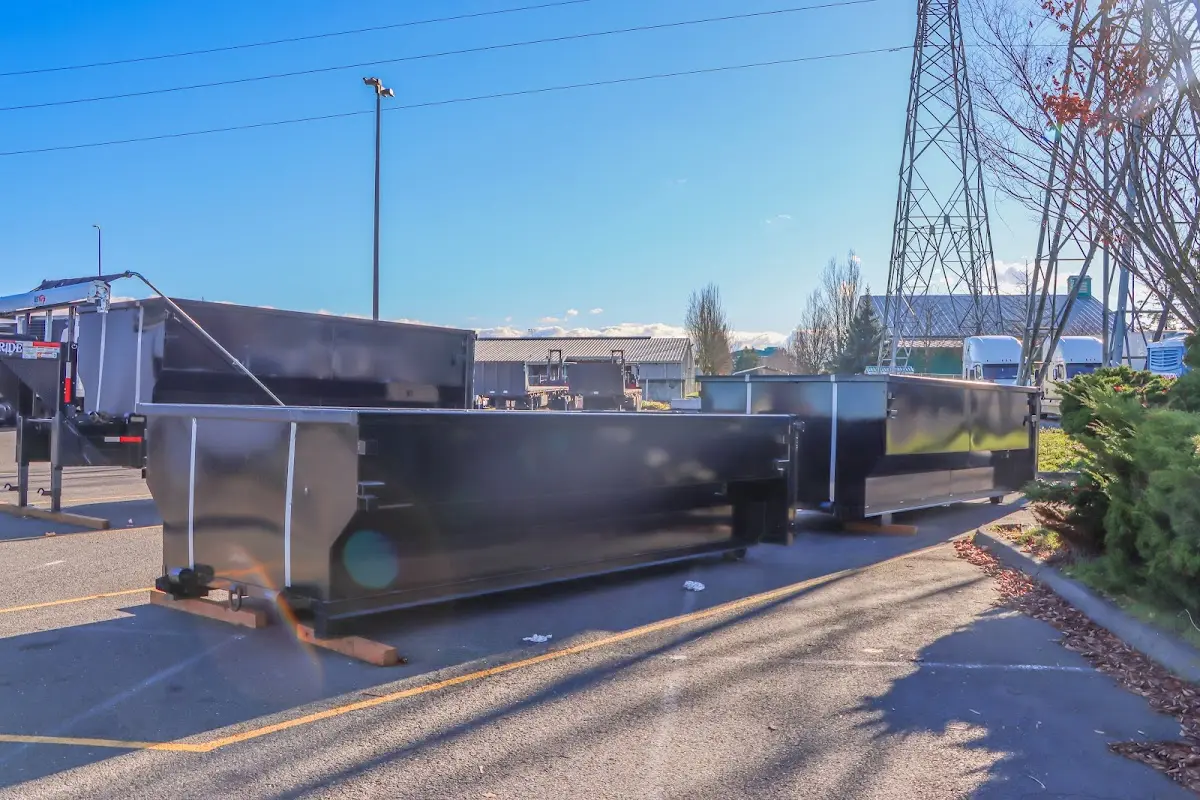 Roll-off dumpster ready for waste disposal at job site for 12 Yard Dumpster Rental in Durham